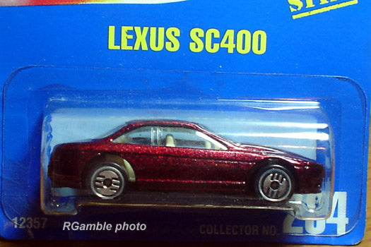 Maroon Hot Wheels Lexus SC400 with tan interior and Ultra Hots wheels in a blue blister card marked 12357 and collector number 264