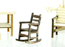 Banta Modelworks 722 O scale rocking chair kit, one assembled chair shown; surrounding furniture is separate.