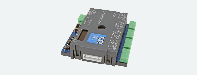 ESU 51830 SwitchPilot 3 accessory decoder with OLED display and connection terminals.