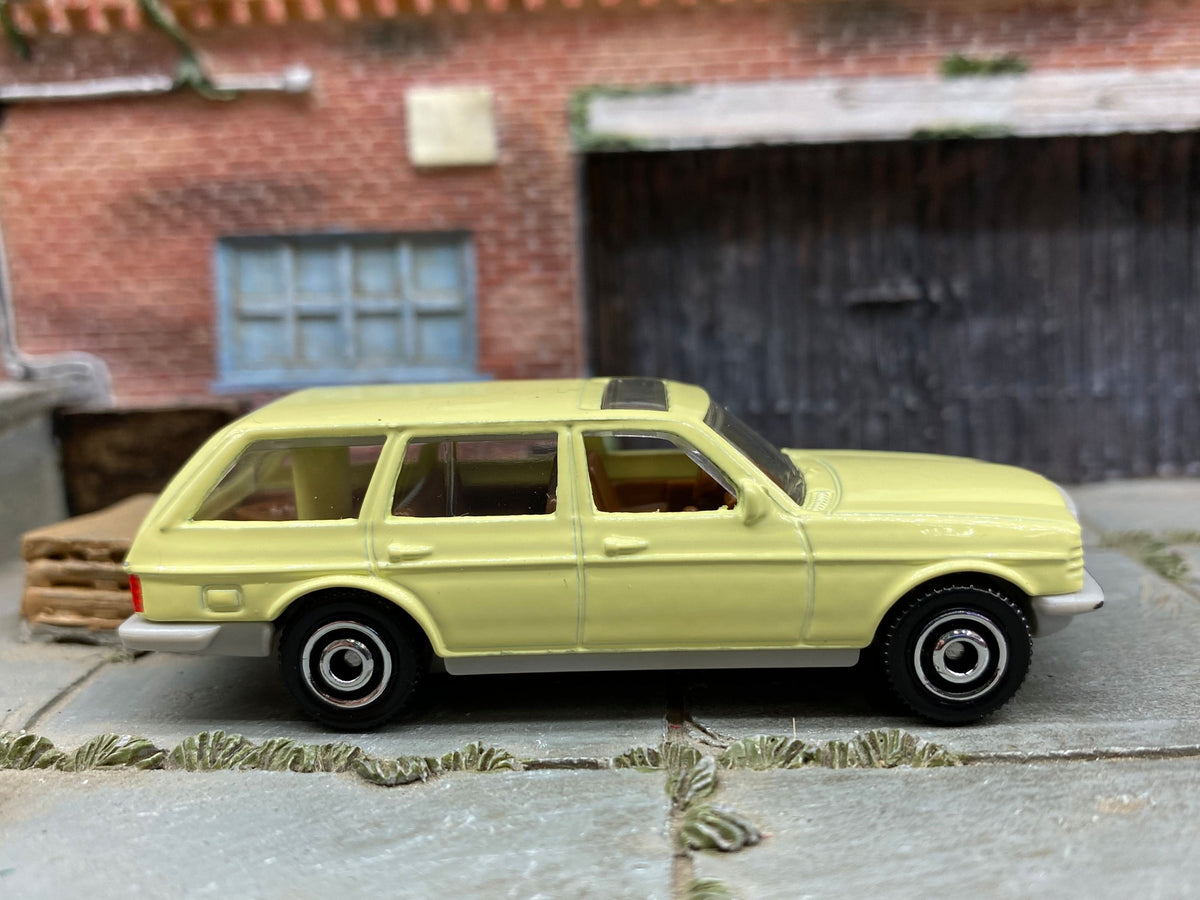 Matchbox 1980 Mercedes-Benz W123 Wagon light yellow loose diecast - gallery image 1 of 3
