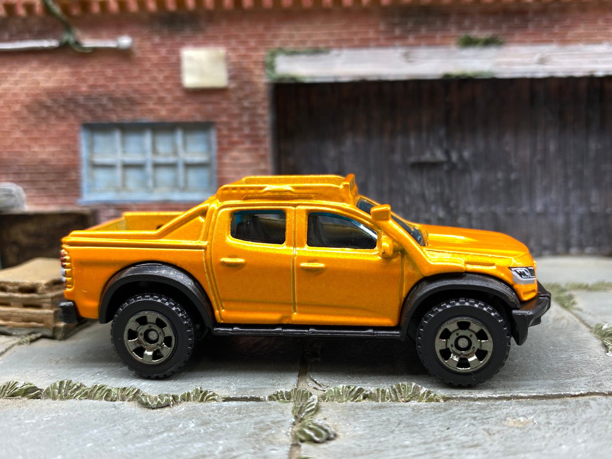 Matchbox 2016 Chevy Colorado 4X4 orange loose diecast - gallery image 1 of 3