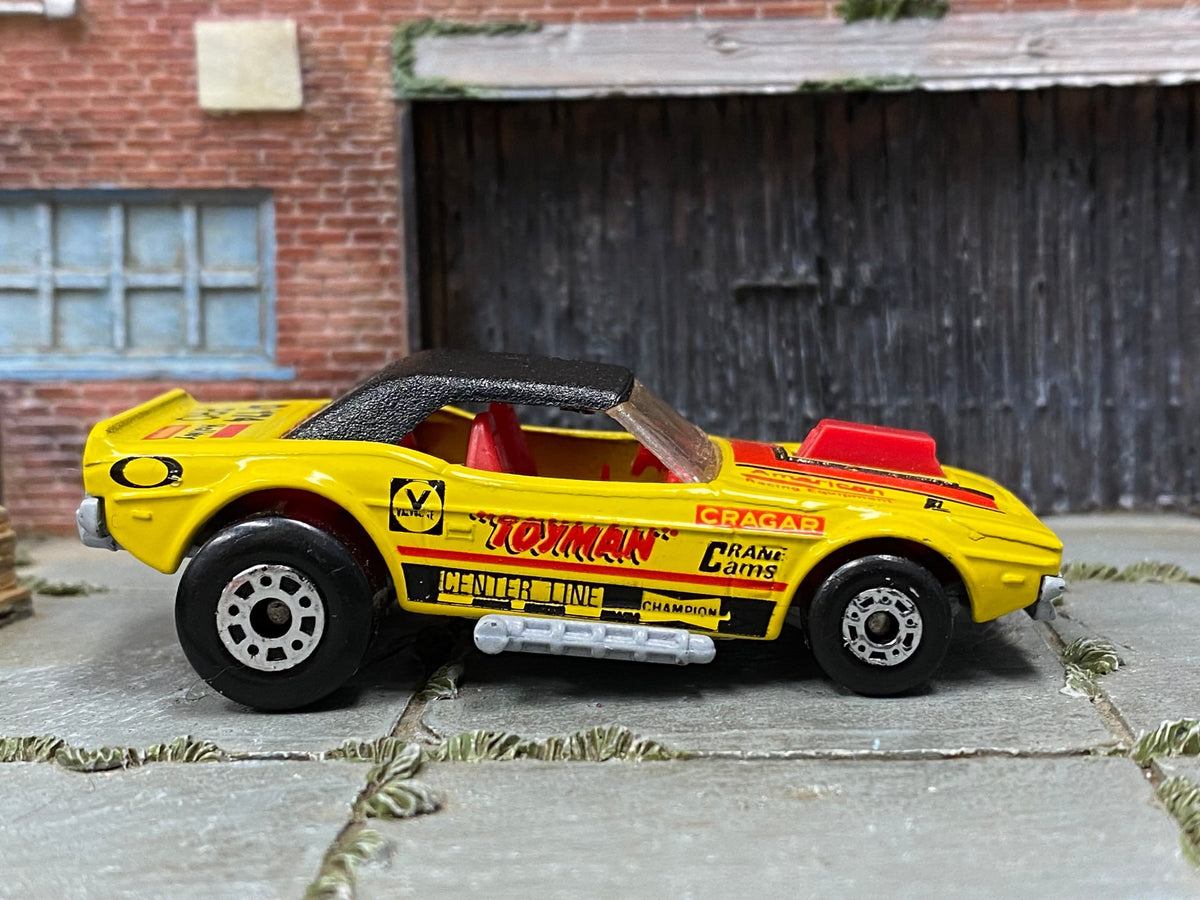 Matchbox Dodge Challenger (1975) in Yellow and Red, loose diecast car