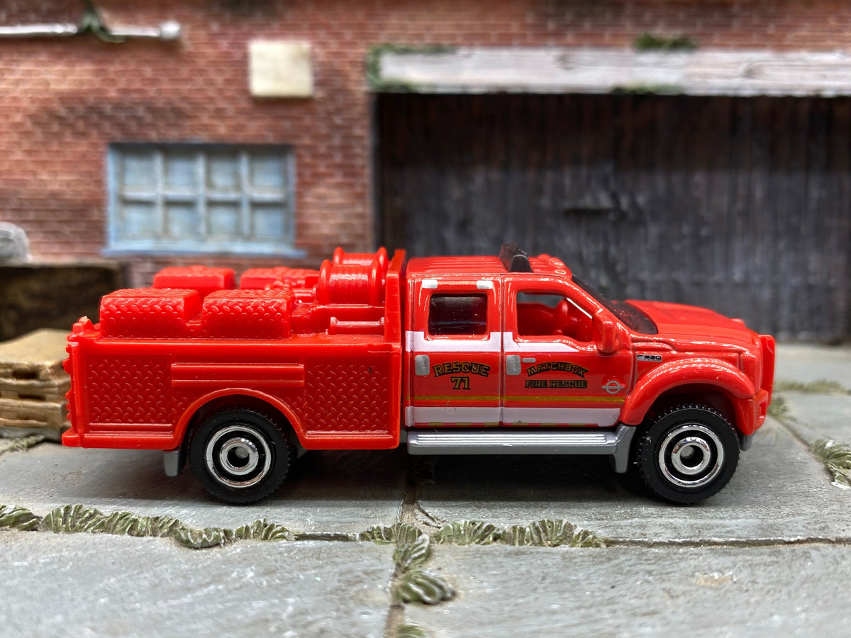 Loose Matchbox Ford F-550 Super Duty- Red Fire and Rescue in - front three-quarter view 1:64 scale diecast
