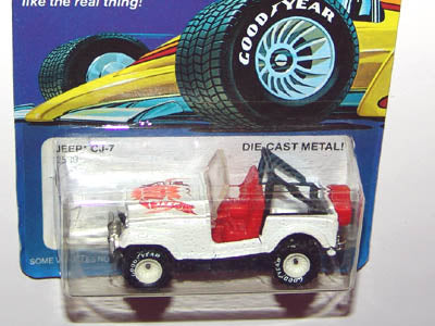 White 1986 Jeep CJ-7 with red interior and white-hub Real Riders in item 2539 packaging