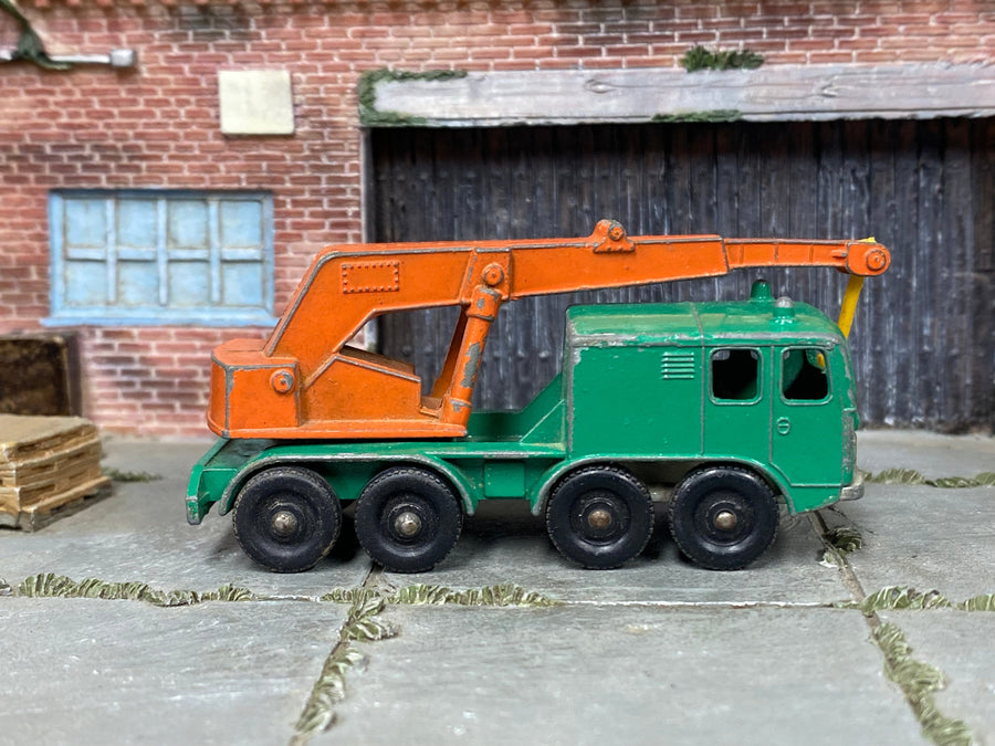 Green and orange Lesney Matchbox No.30 eight-wheel crane from the linked catalog listing