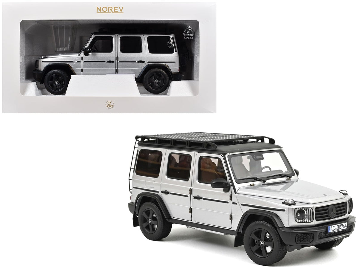 Norev 183030 Mercedes-Benz G-Class Professional in silver with black roof and roof rack, 1:18