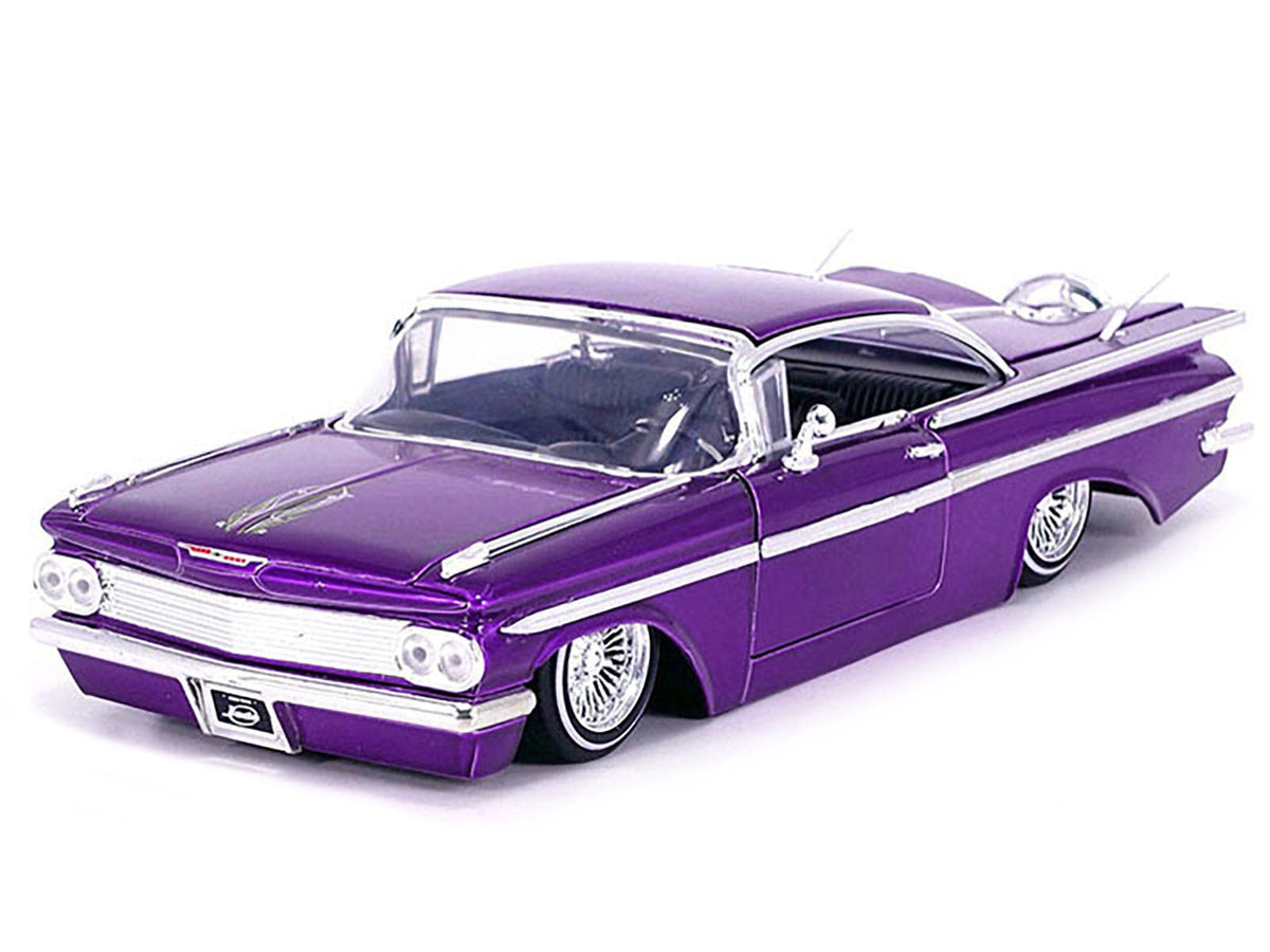 Jada Street Low 35591 candy-purple 1959 Chevrolet Impala lowrider with wire-style wheels, 1:24 scale
