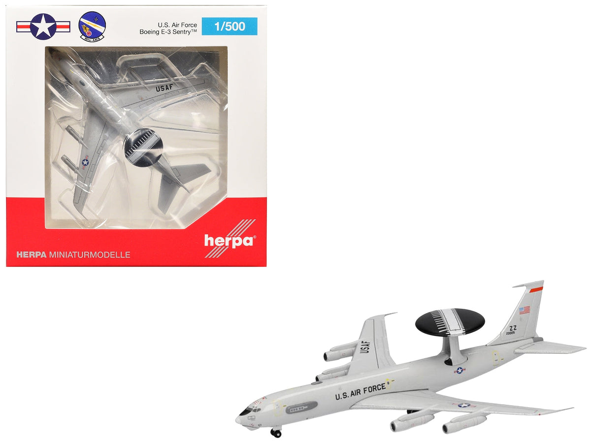 Herpa Boeing E-3 Sentry 81-0005 in gray with its black elevated radar dome, shown loose and packaged in 1:500