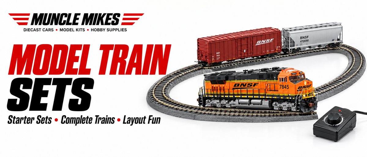 Muncle Mikes model train sets collection artwork: illustrative diesel locomotive, freight cars, oval track and controller on a white MM banner.