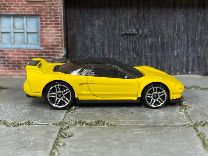 Hot Wheels ’90 Acura NSX yellow with silver wheels — right side view