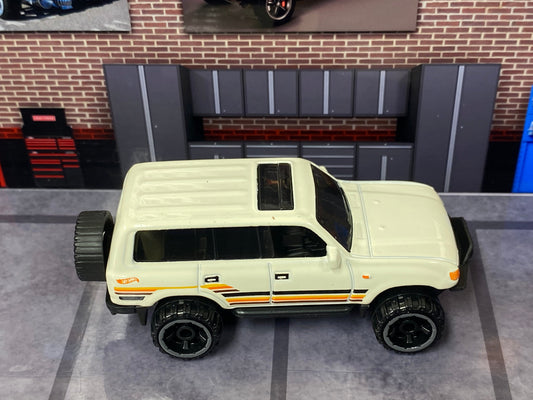 Loose Hot Wheels - Toyota Land Cruiser 80 - White, Orange and Black