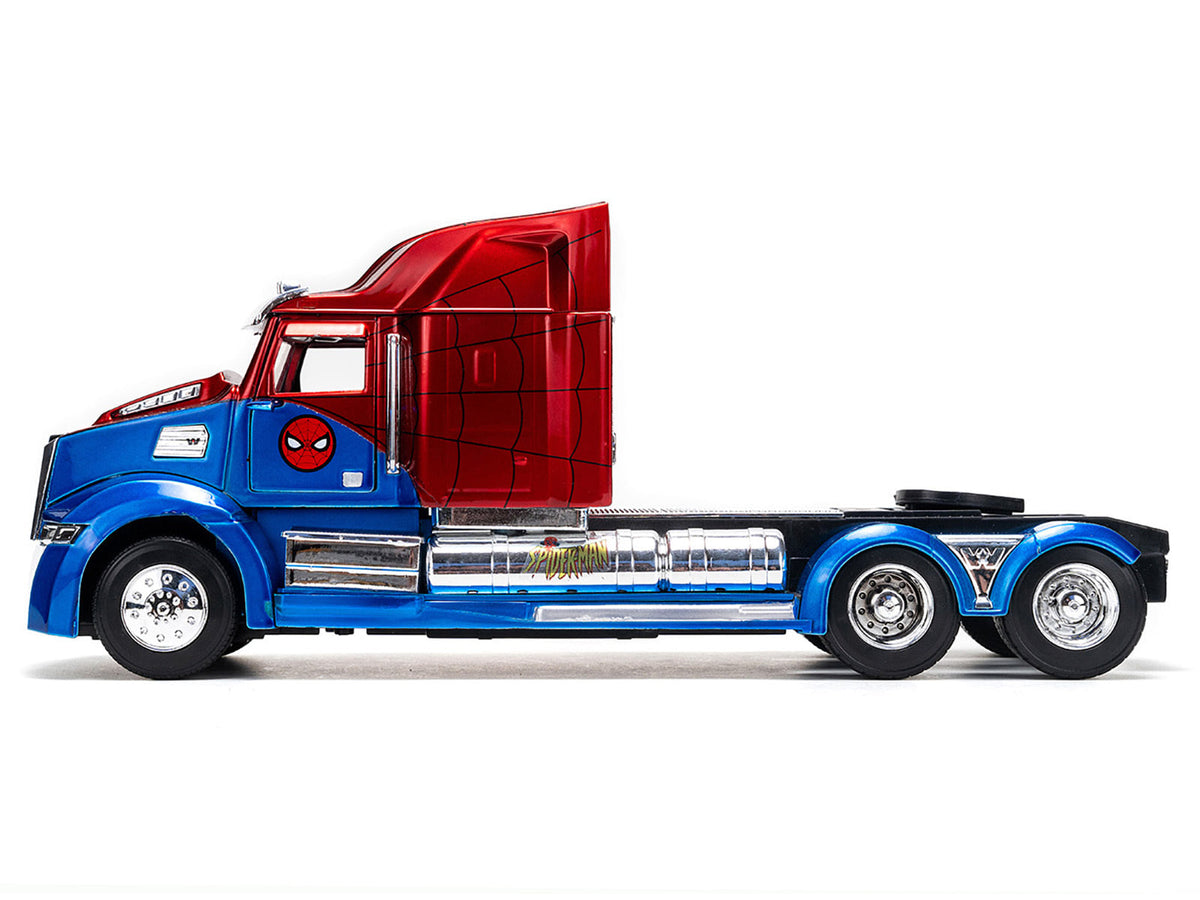 Driver-side profile of the blue and red metallic Western Star 57X tractor with Spider-Man graphics, item 35408