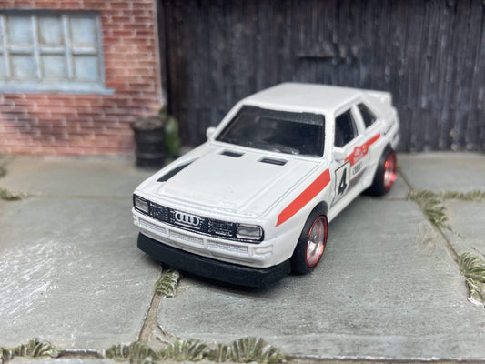 Custom Hot Wheels 1984 Audi Sport Quatro In White Red and Green Livery With Chrome and Red 4 Spoke Race Wheels With Rubber Tires