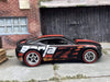 Custom Hot Wheels 2016 Chevy Camaro SS In Black and Red With Borla Livery With Chrome 5 Spoke Race Wheels With Redline Rubber Tires