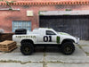 Custom Painted Hot Wheels Toyota Tacoma Off Road in Custom White Monster Energy Racing Livery With Green 5 Star Racing Wheels With off Road Rubber Tires