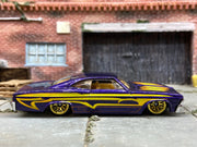 Loose Hot Wheels 1965 Chevy Impala Dressed in Purple and Yellow