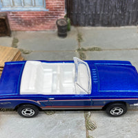 Loose Hot Wheels 1965 Ford Mustang Convertible Dressed in Blue, Red and White