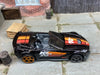 Loose Hot Wheels Chevy Corvette C7 Z06 Convertible Dressed in Black and Orange K&N
