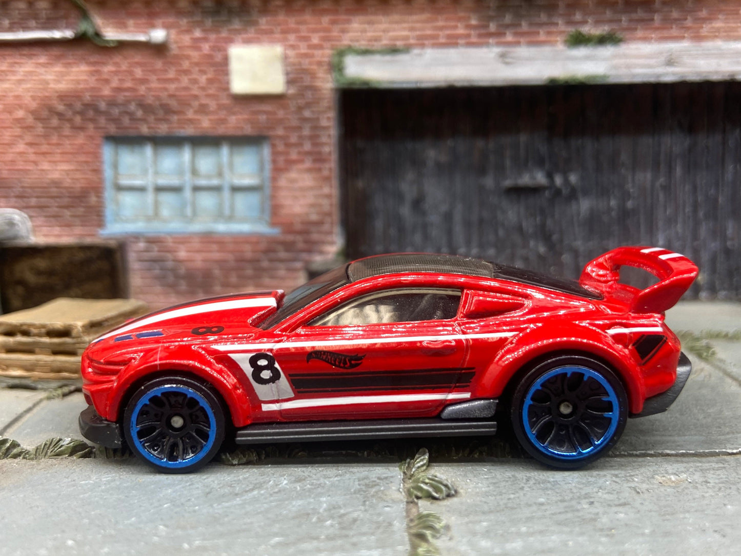 Loose Hot Wheels Custom 2015 Ford Mustang Race Car Dressed in Red, White and Black