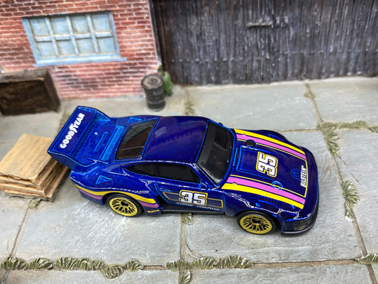 Loose Hot Wheels - Porsche 935 - Blue, Yellow and Pink Goodyear 35