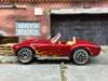 Loose Hot Wheels Shelby Cobra 427 S/C Dressed in Dark Red With Flames