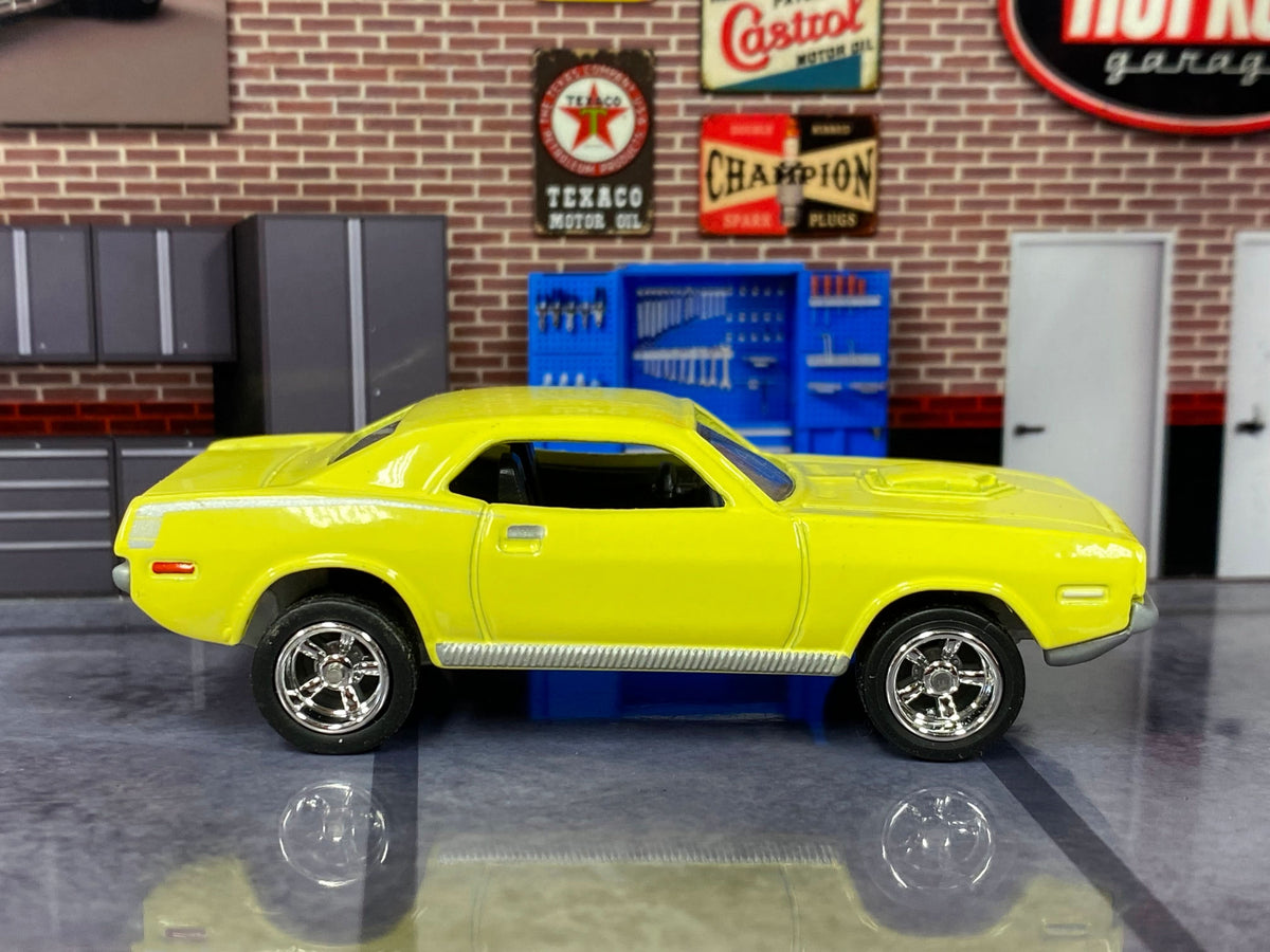 Yellow 1970 Plymouth Cuda custom Matchbox, left side with chrome AMR wheels