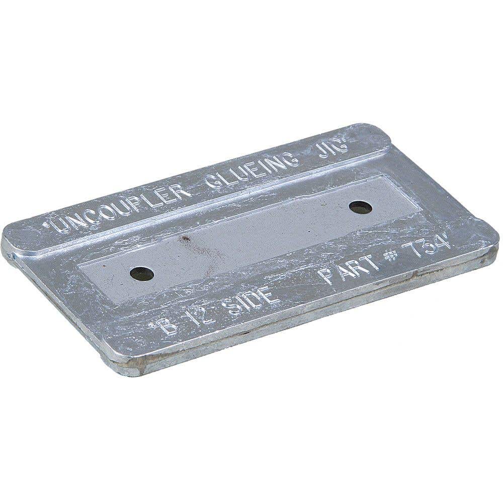 Kadee 334 uncoupler gluing jig with model number and alignment markings