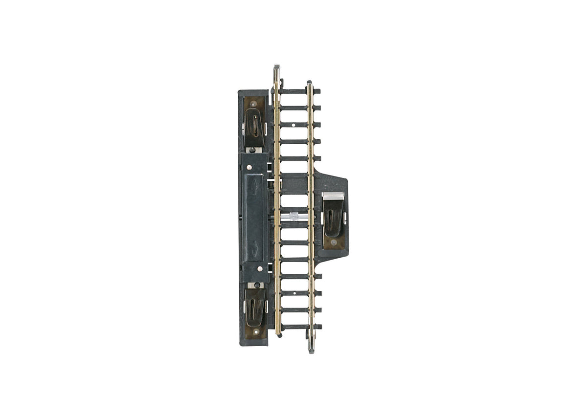 Märklin 8589 straight Z scale circuit track with its switching contacts and terminal clips.