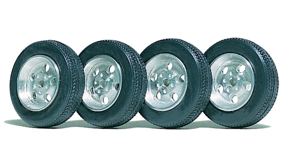 Four PineCar P349 display wheels with metal mags and rubber tires assembled