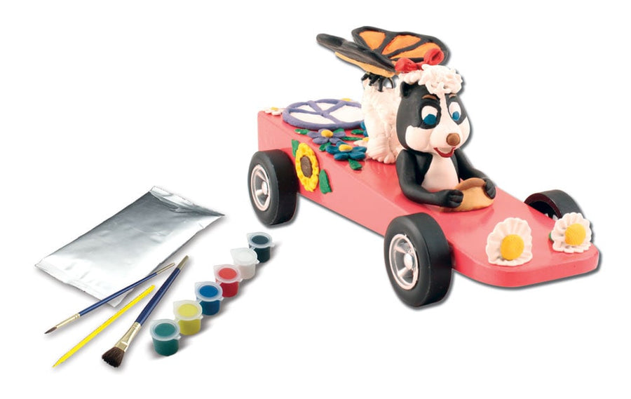 PineCar P3929 Featherweight Customizing Kit with sculpting clay, paint strip, tool and brushes; decorated car shown as an example