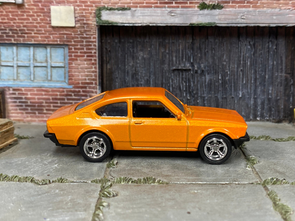 Custom Matchbox Volkswagen Golf GTI Mk1, Metallic orange with chrome wheels, side view