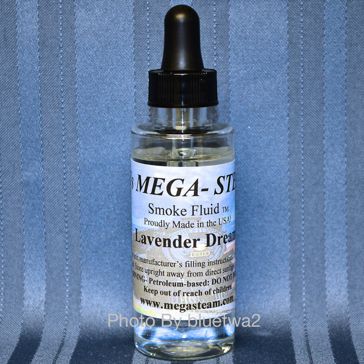 JT's Mega-Steam Lavender Dream smoke fluid, 2 oz glass dropper bottle showing the scent label