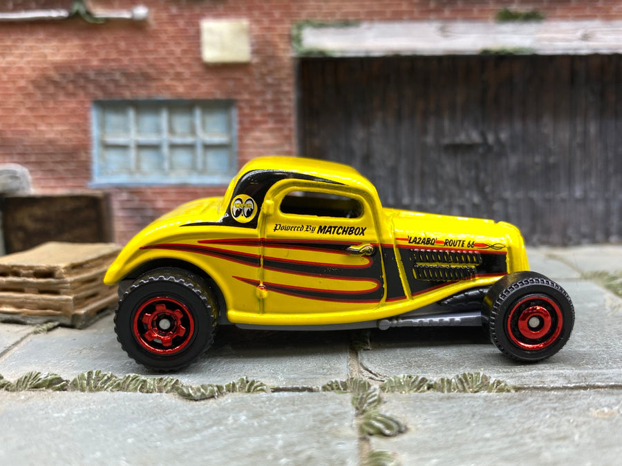 Matchbox 1933 Ford Coupe in Yellow, Black and Red Mooneyes Livery, loose diecast car