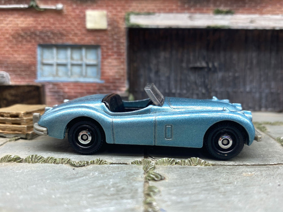Matchbox 1956 Jaguar XK140 Convertible in Light Blue, loose diecast car