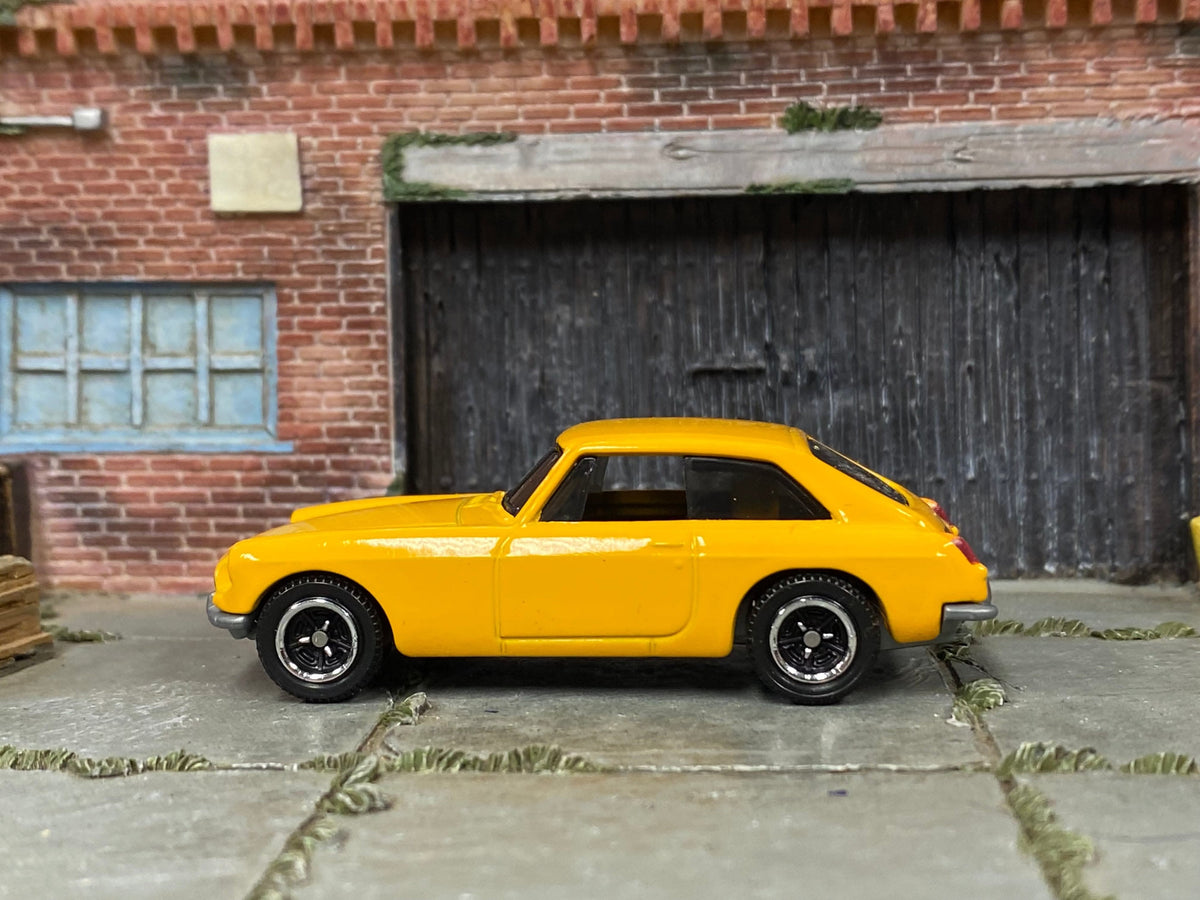 Matchbox 1971 MGB GT Coupe yellow loose diecast - gallery image 1 of 3