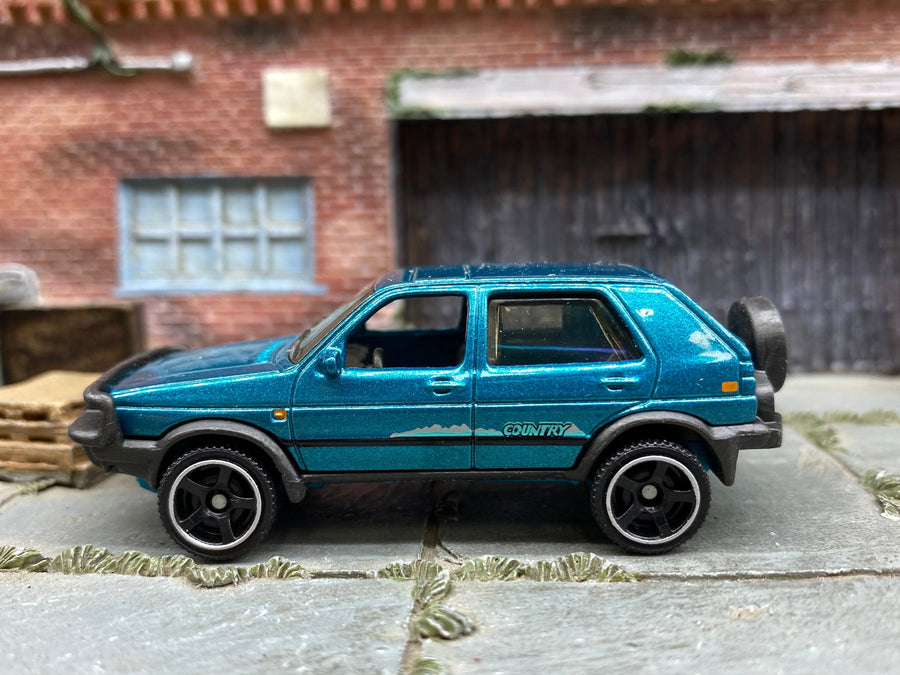 Teal loose Matchbox 1990 VW Volkswagen Golf product photo