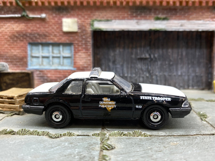 Matchbox 1993 Ford Mustang LX SSP Coupe in Black and White Texas State Trooper, loose diecast car