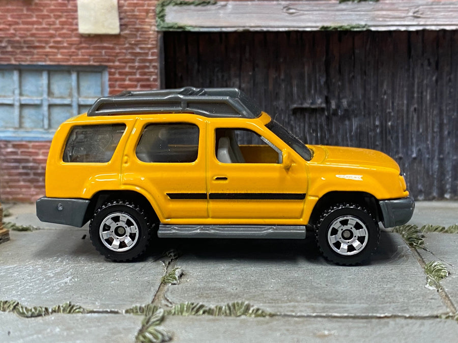 Matchbox 2000 Nissan XTerra in Yellow, loose diecast car