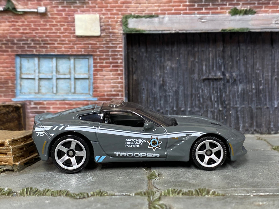 Matchbox 2015 Corvette Stingray in Gray and White Trooper Highway Patrol, loose diecast car