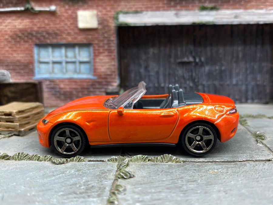 Matchbox 2015 Mazda MX-5 Miata in Orange, loose diecast car