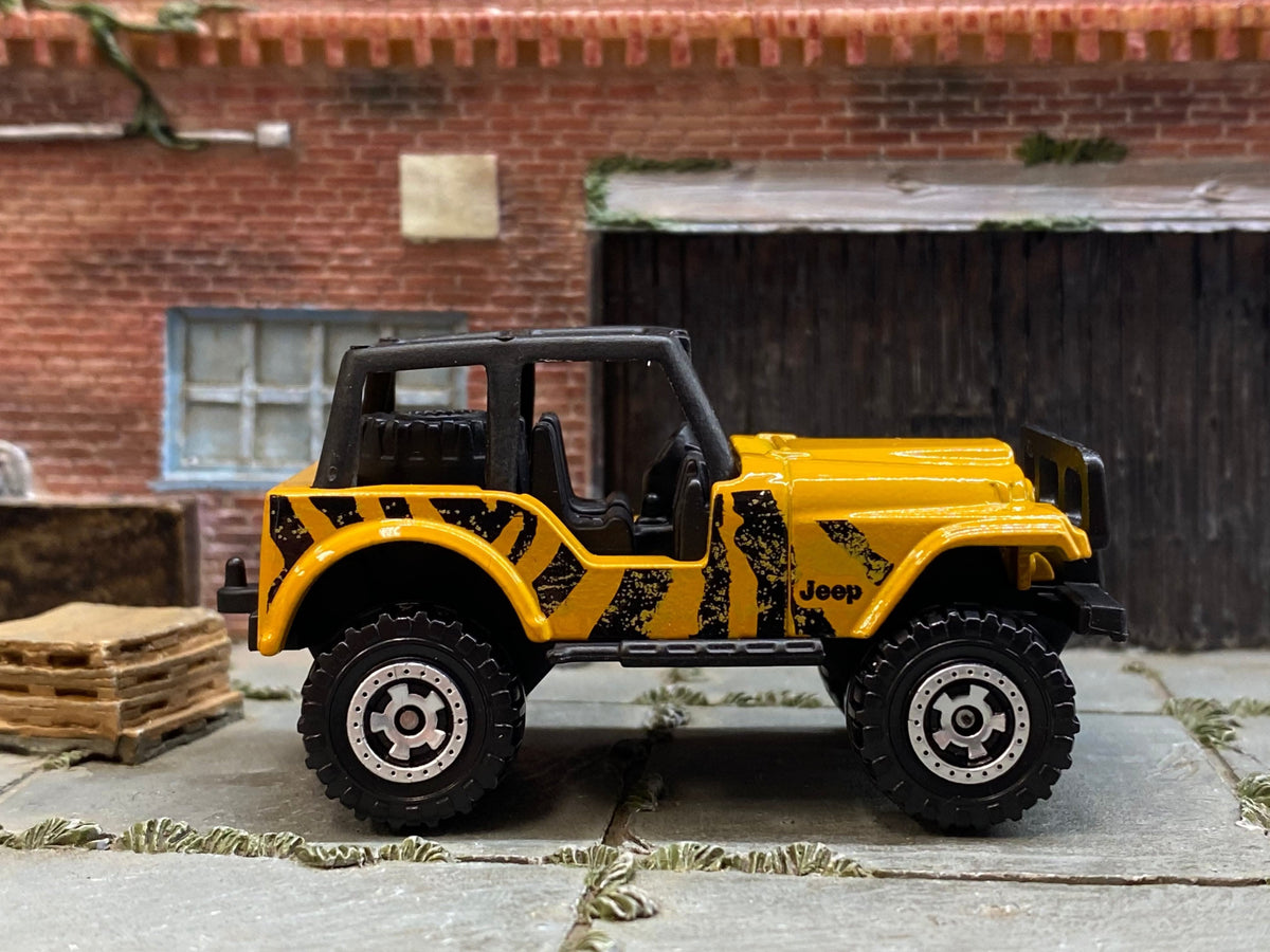 Matchbox Jeep 4X4 orange and black tiger stripe loose diecast - gallery image 1 of 3