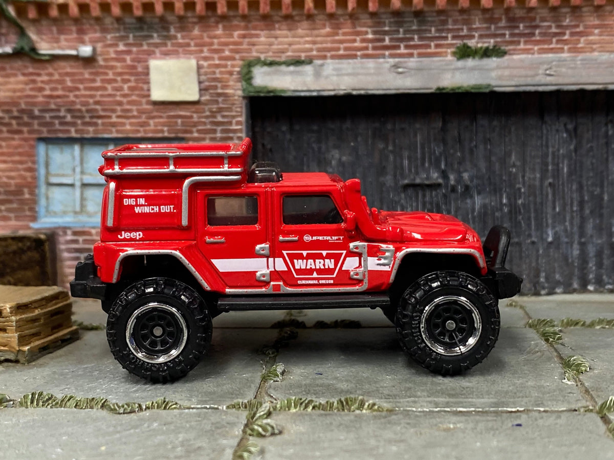 Matchbox Jeep Wrangler Superlift in Warn Red and White, loose diecast car