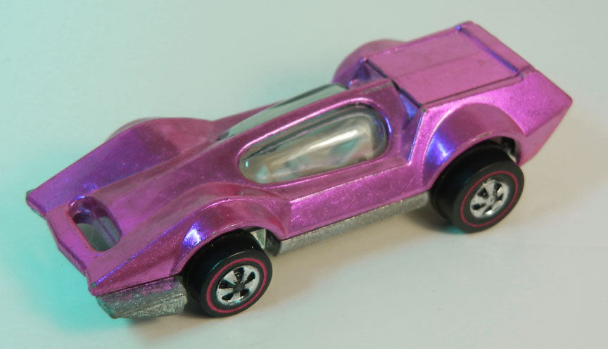 Pink Bugeye with smooth rear hatch, clear glazing and redline wheels, front three-quarter view