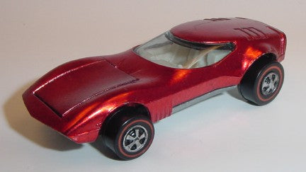 Red Torero with clear windshield, light interior and redline wheels, front three-quarter view