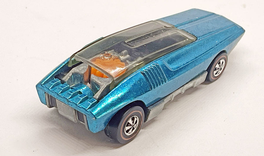 Blue Whip Creamer viewed from the rear with orange turbine visible beneath its transparent sliding canopy