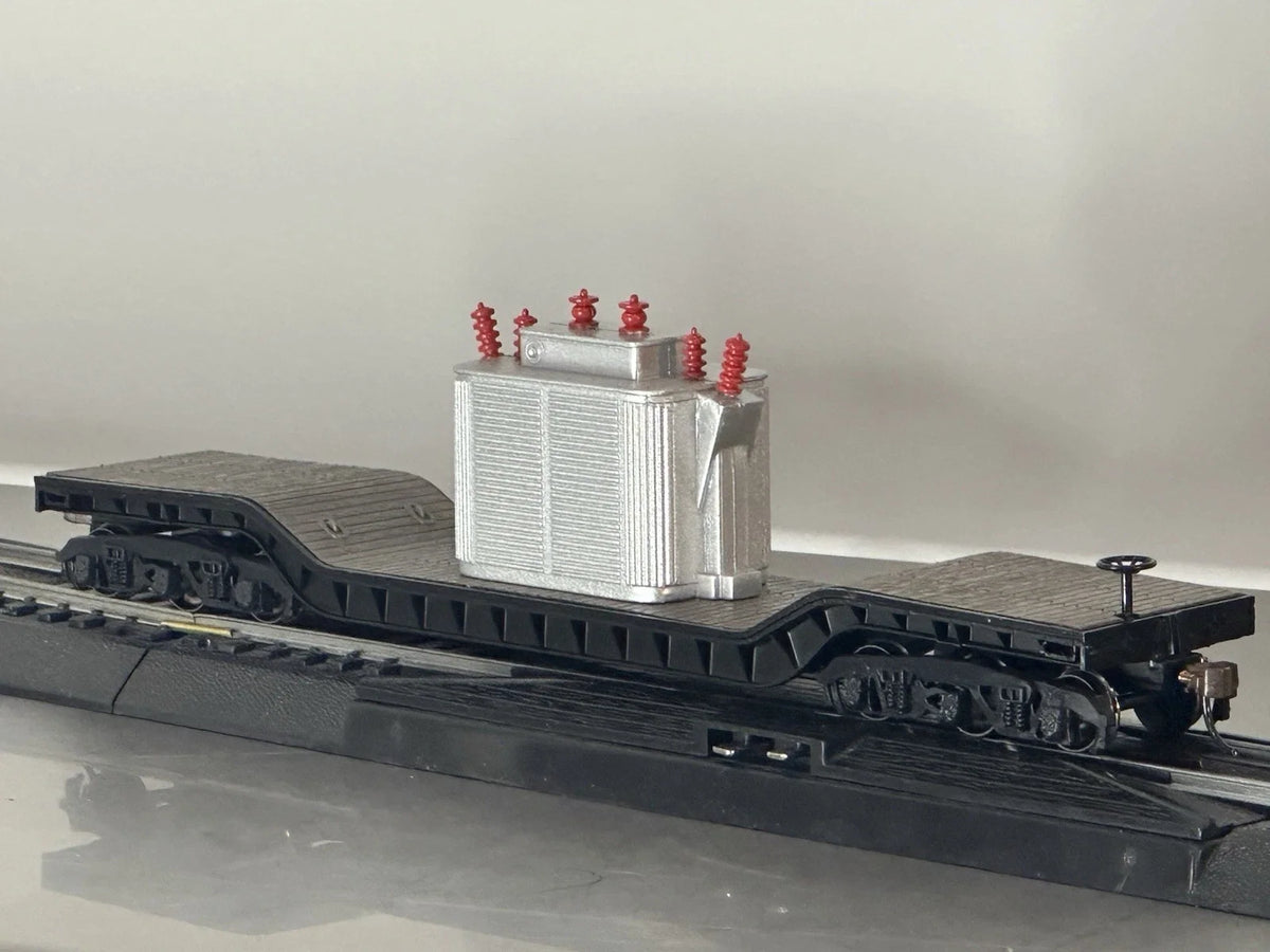 Bachmann 18348 HO center-depressed flat car with gray transformer load
