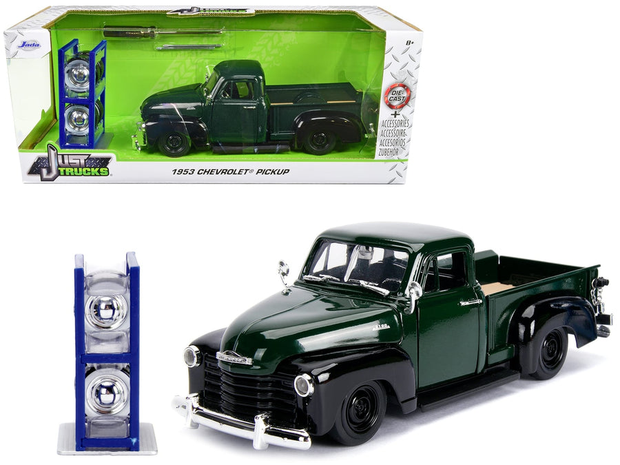 Jada 30521 green 1953 Chevrolet 3100 pickup with extra wheels and Just Trucks packaging, 1:24 scale