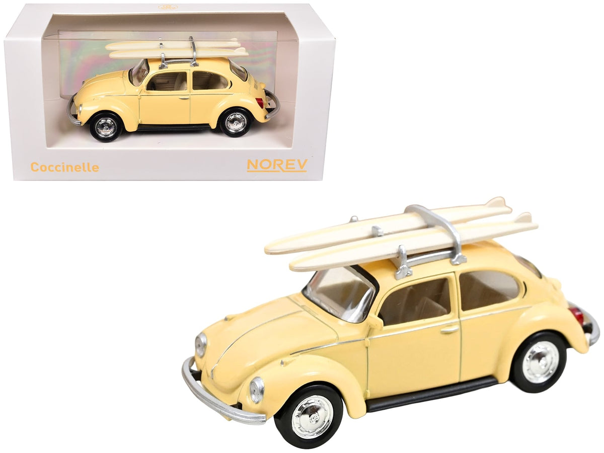 Norev 841007 pastel-yellow Volkswagen Beetle 1303 with roof rack and two surfboards, a compact 1:43 gift option