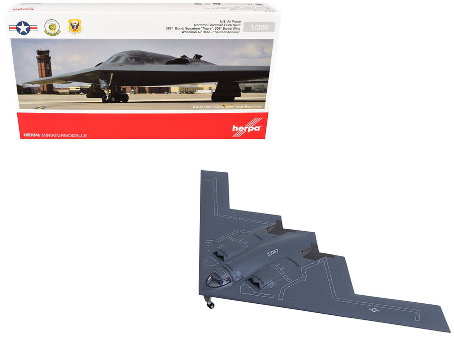 Herpa B-2A Spirit of Arizona in 1:200, showing its broad flying-wing shape beside the product package