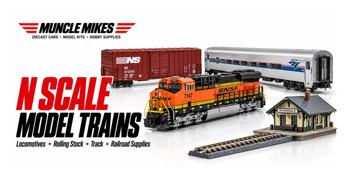 Muncle Mikes collection artwork: illustrative N scale locomotive, freight cars, passenger car, track and station scenery